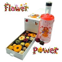 Flower Power ladebox van Chocoseum met bloemenlikeur en 30 handgemaakte bonbons en truffels, stijlvol verpakt als kleurrijk lux
