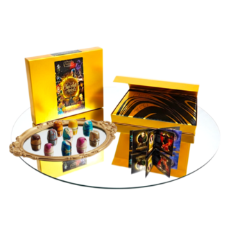 Open chocoladebox met 12 artist bonbons in unieke vormen en kleuren