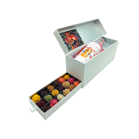 Flower Power ladebox van Chocoseum met bloemenlikeur en 30 handgemaakte bonbons en truffels, stijlvol verpakt als kleurrijk lux